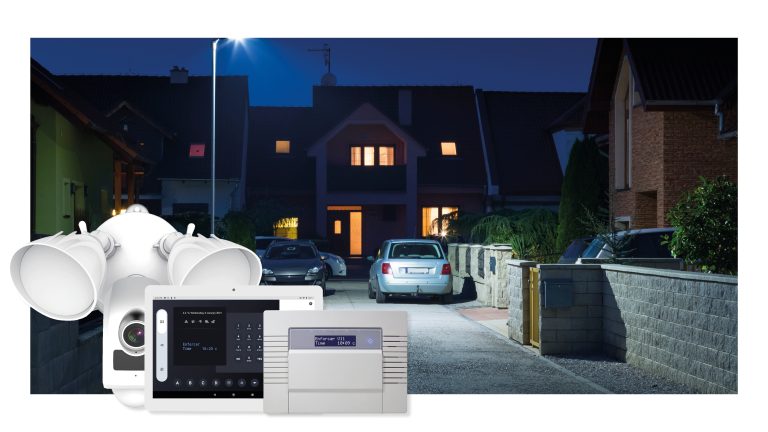 backdrop of a house - security camera in the foreground lightcamera